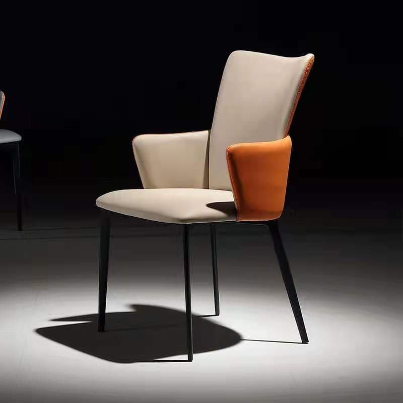 BRFOY-659 dining armchair in cream leather with an orange back, shown against a dark backdrop