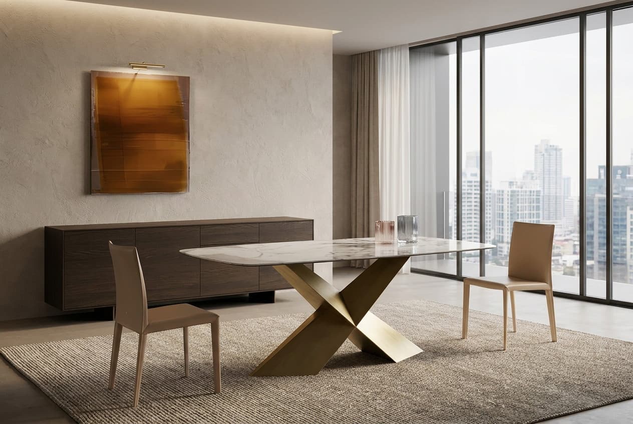 BRT21010A rectangular marble-top dining table on a crossed-blade brass base, in a bright room with a city view